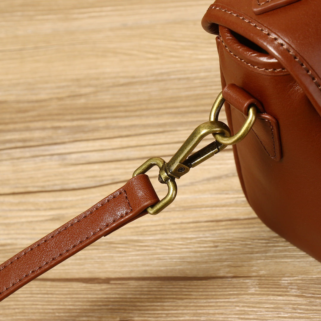 Female cowhide messenger bag