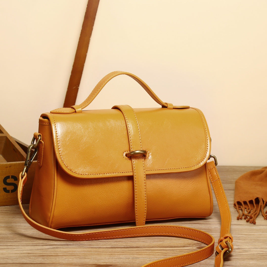 Female cowhide messenger bag