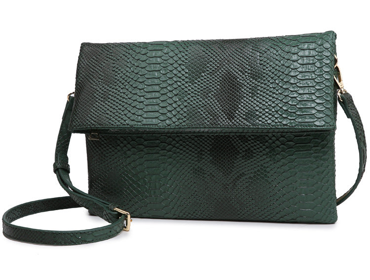 Female folding clutch bag - serpentine grain