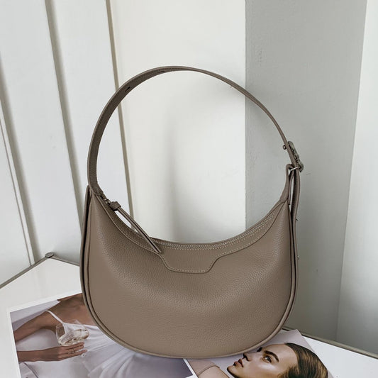 Female half-moon leather bag