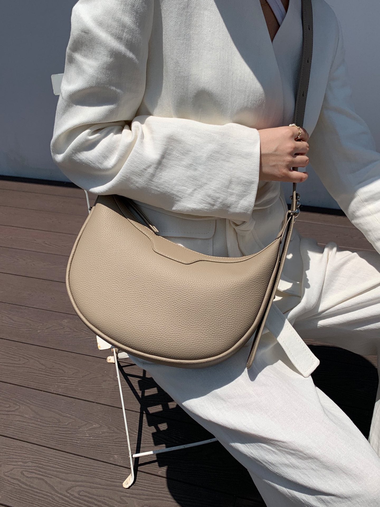 Female half-moon leather bag