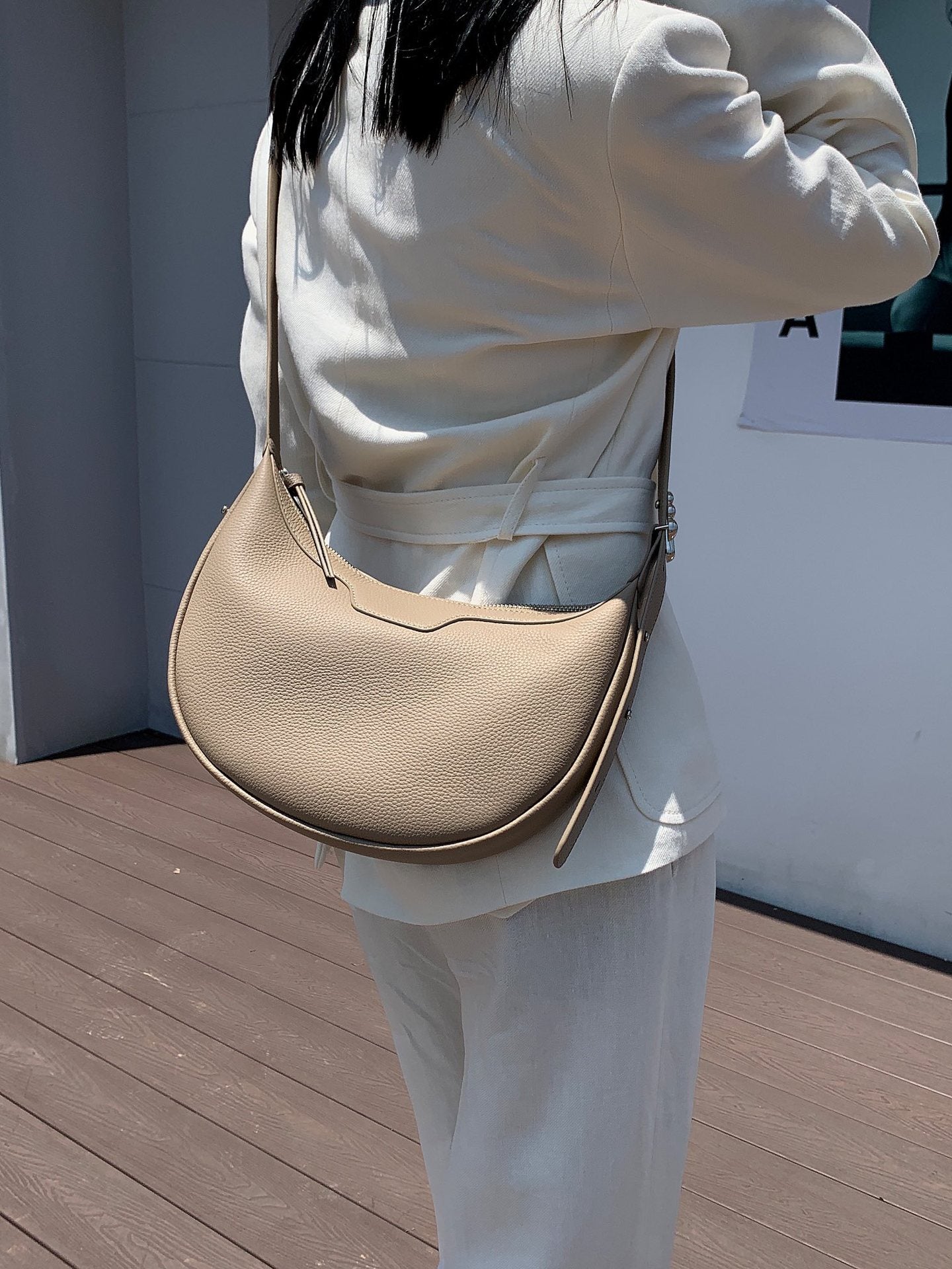 Female half-moon leather bag