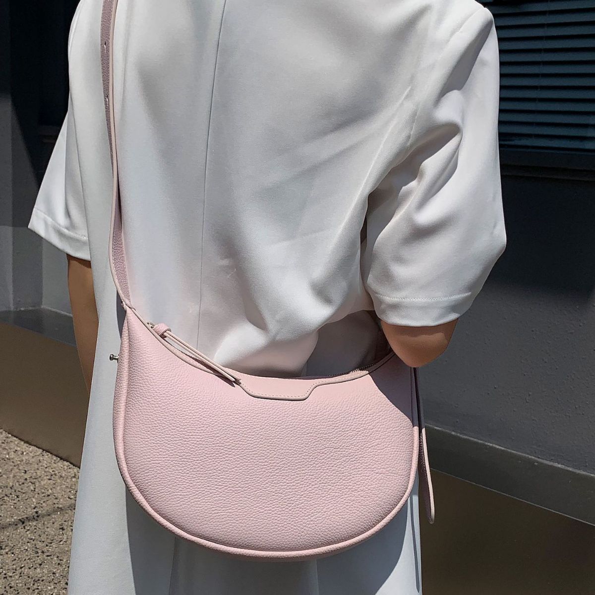 Female half-moon leather bag